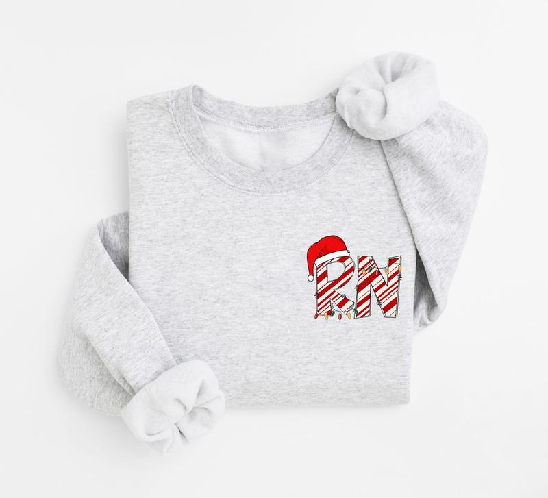 Christmas Registered Nurse Sweatshirt, Christmas Nurse Sweater, RN Christmas Gift Shirt, Merry Nurse Shirt, Christmas RN Shirt, Registered Nurse Holiday Shirt, Nurse Shirt Gift for Men and for Women